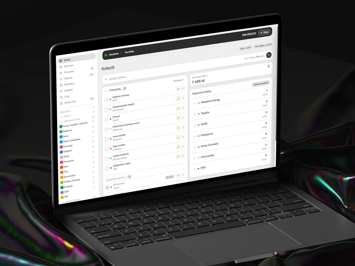 Kokpit's dashboard on a laptop — priorities, active projects and pending invoices